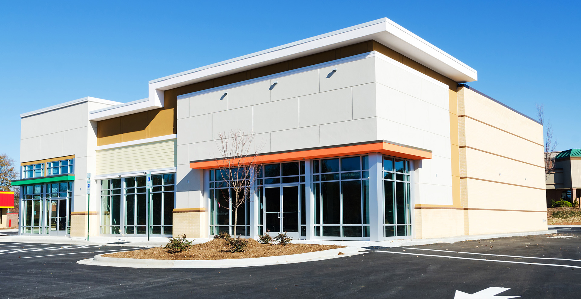 exterior of retail building with tall windows