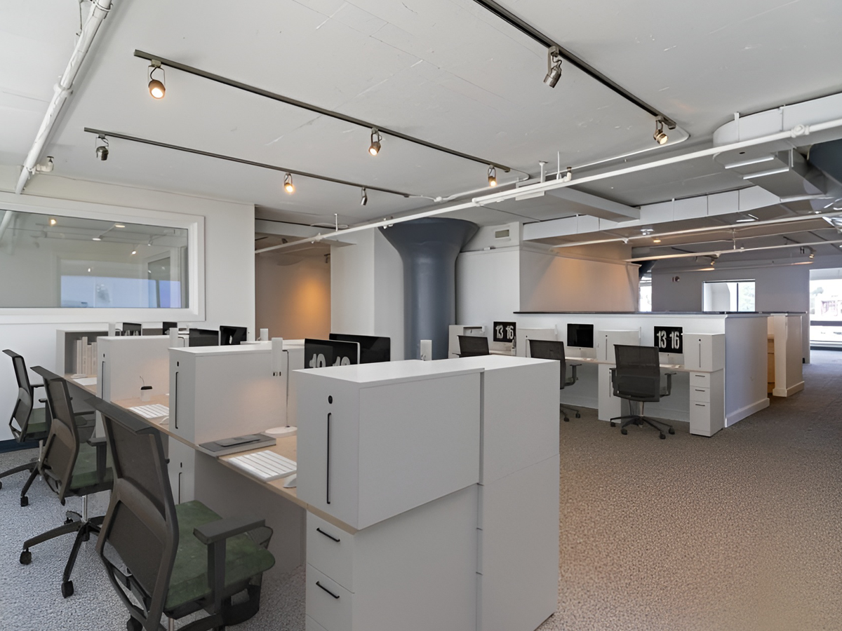 open office area staged with desks and chairs