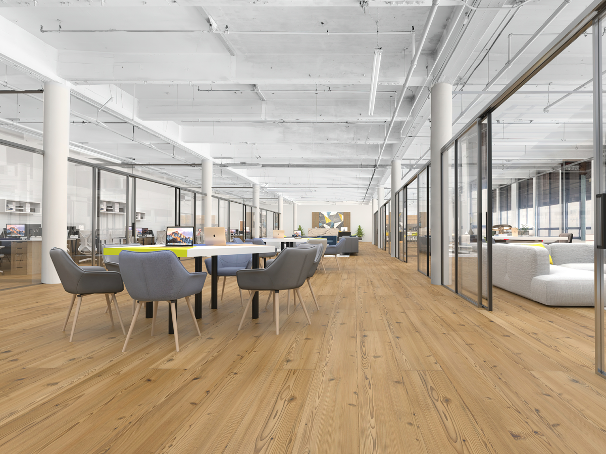 Open office area staged with tables and chairs