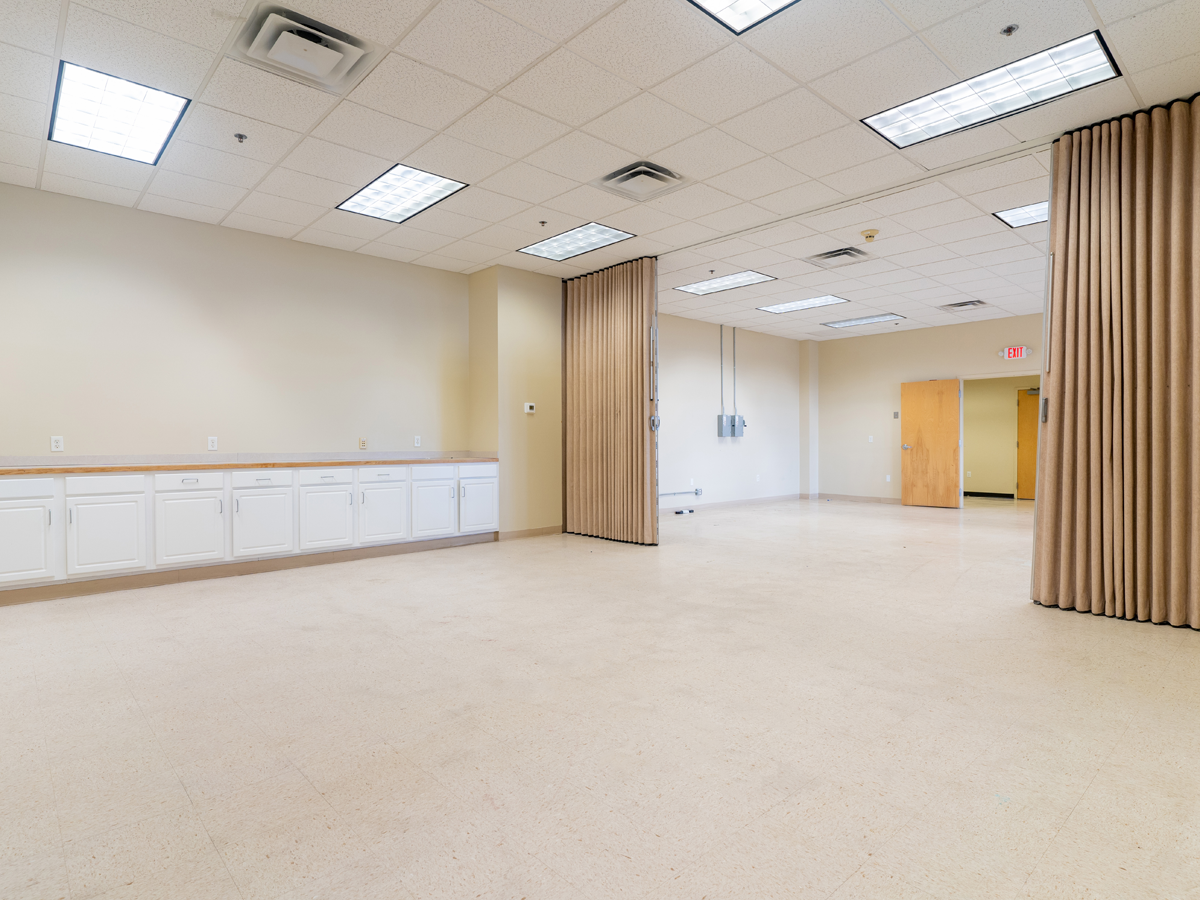 large open space with cabinet storage