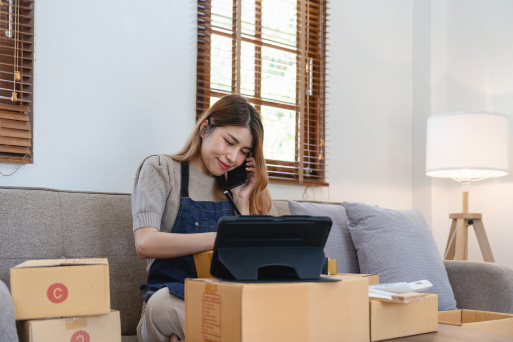 woman-business-owner-working-packing-up-orders