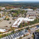 Aerial view of 34 Forest Street and its parking lot in Attleboro, MA